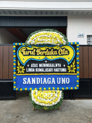 Papan Bunga Duka di Poka
